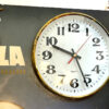 Pannello Lavazza con orologio vintage